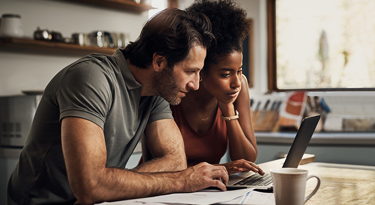 Man And Woman Using laptop